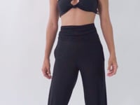 Load and play video in Gallery viewer, Video: Rio De Sol Beach Trousers Black Pants Knot